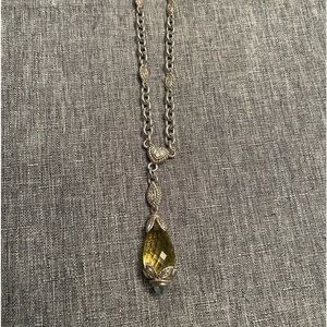 18 inch chain with 2 inch drop that has a lemon quartz pendant with blue topaz